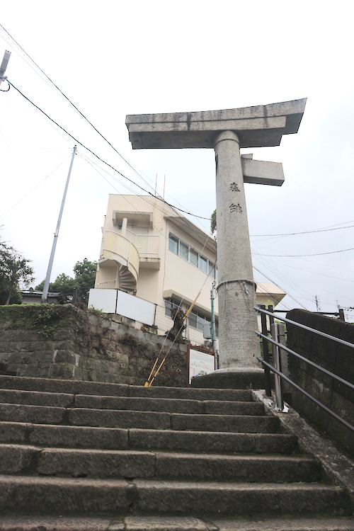 Sanno shrine's one-legged torii gate. Kyushu Japan travel guide: Nagasaki and Kumamoto