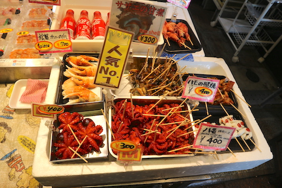 Mini octopus at Nishiki market. Kyoto travel guide.