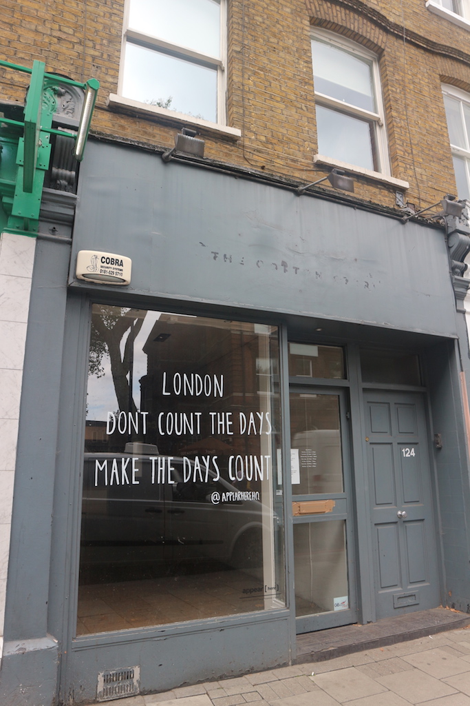 Angel Islington London. Positive message. Empty shop.